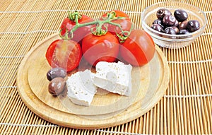 Fresh tomatoes, olives and whote cheese