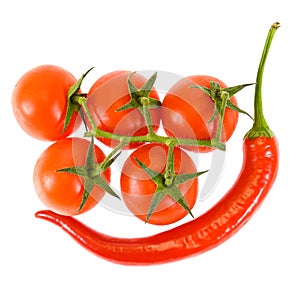 Fresh tomatoes and red chili pepper isolated on white background