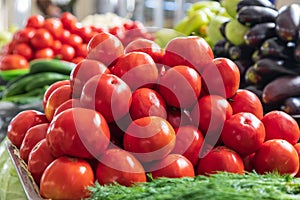 Fresh tomatoes for sale at the Mehrgon Market in Dushanbe