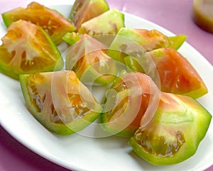 Fresh tomatoes sliced closeup