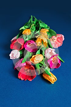 Fresh tulips bouquet on blue background