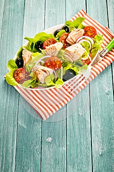 Fresh tuna salad on a summer picnic table