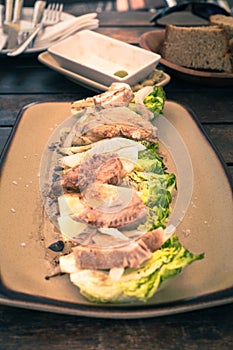 Fresh tuna steak with vegetable in Spanish restaurant