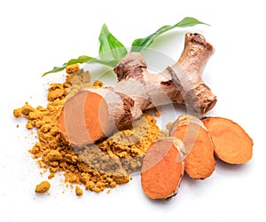 Fresh turmeric rhizome and turmeric powder isolated on white background