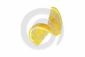 Fresh twisted lemon slices isolated on white background