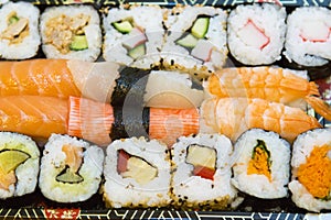 Fresh unbox sushi prepared to be eaten photo