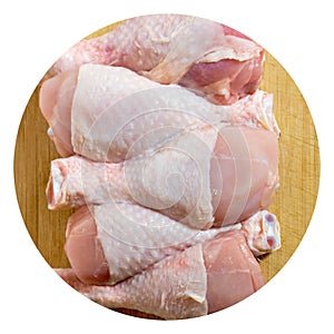 Fresh uncooked chicken meat drumsticks pieces, baget ready to cook