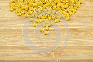 Fresh uncooked gold colored pasta