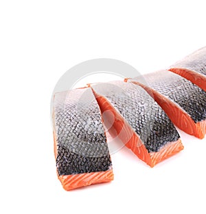 Fresh uncooked red fish fillet slices.