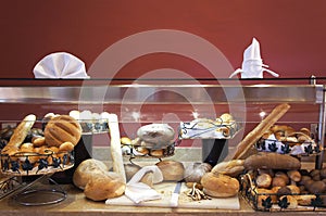 Fresh various breads on the counter. buffet at the hotel.