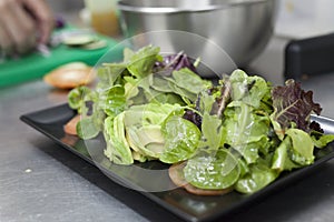 Vegan food salad elaboration concept.