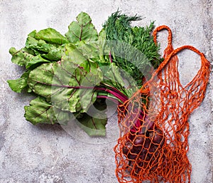 Fresh vegetable in fishnet bag