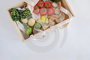 Fresh vegetable and fruit in the wood box for healthy vegan diet concept and product delivery