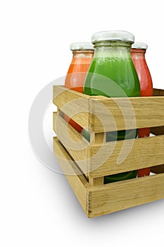 Fresh vegetable juices on white