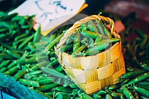 Fresh Vegetable Organic Green Beans In Decorative Wicker Basket.