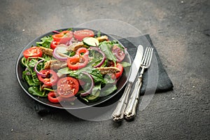 Fresh vegetable salad with chicken meat, herbs and olive oil