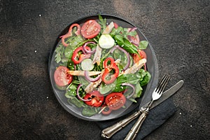 Fresh vegetable salad with chicken meat, herbs and olive oil