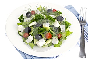 Fresh vegetable salad with feta, olives