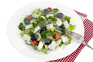 Fresh vegetable salad with feta, olives