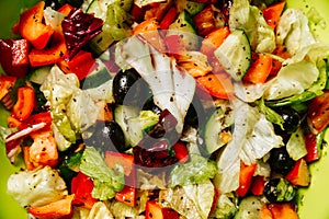 Fresh vegetable salad for vegetarians with tomatoes, cucumbers, olives. Healthy eating