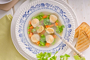 Fresh vegetable soup with chicken dumplings