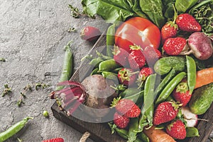 Fresh vegetables, berries, greens and fruits in tray