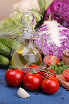 Fresh vegetables on a blue wooden table. Ingredients for cooking