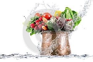 Fresh vegetables in copper pot
