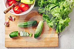 Fresh vegetables on a cutting board, salad ingredients