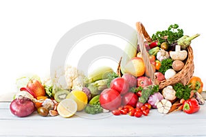 Fresh vegetables and fruit in basket.