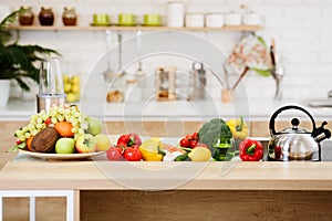 Fresh Vegetables And Fruits On Kitchen Table