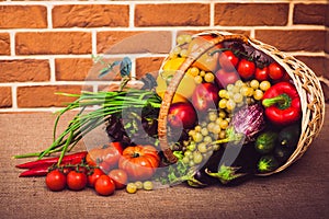 Fresh vegetables, fruits and lettuce on kitchen table. Healthy l