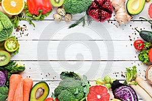 Fresh vegetables and fruits on a white wooden background. Healthy Organic Food.