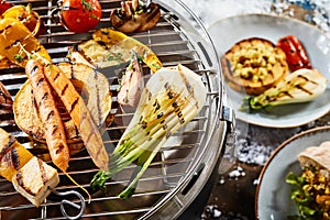 Fresh vegetables grilling on a winter barbecue