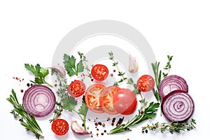 Fresh vegetables and herbs on a white background