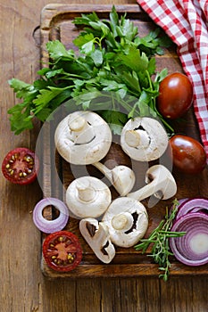 Fresh vegetables mushrooms, tomatoes and onion