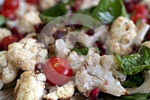 Fresh vegetables salad with Cauliflower and Aragula and balsamic vinegar seasoning