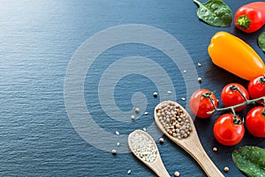 Fresh vegetables and spices from above with negative space for text .