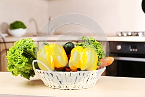 Fresh vegetables on a table in the kitchen.