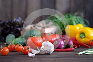 Fresh vegetables: tomatos, cucumbers, peppers, onions, garlic and green seasonings