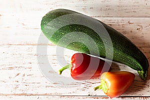 Fresh vegetables on white wooden boards