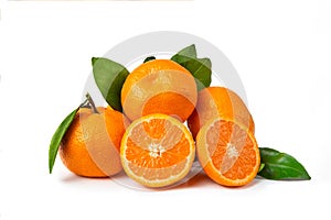 Fresh, vibrant fruits. Several tangerines with a leaf on a white isolated background. One of the tangerines is cut open