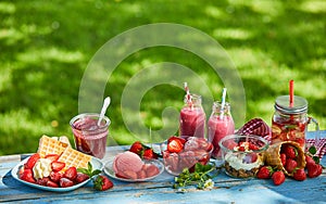 Fresh, vibrant summer strawberry desserts picnic table