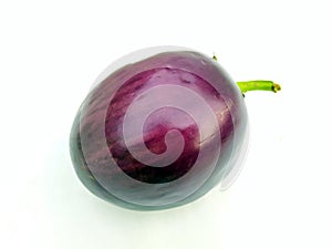 A fresh violet brinjal vegitable isolated put on white background