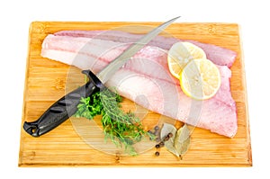 Fresh walleye fillets with knife photo