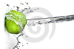 Fresh water splash on green apple