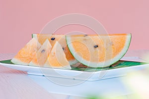 Fresh watermelon yellow on dish.