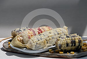 Fresh waxy corn or Sweet glutinous corn and Corn kernels on White background