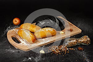 Fresh wheat white bread on a cutting board
