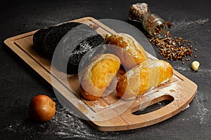 Fresh wheat white bread on a cutting board